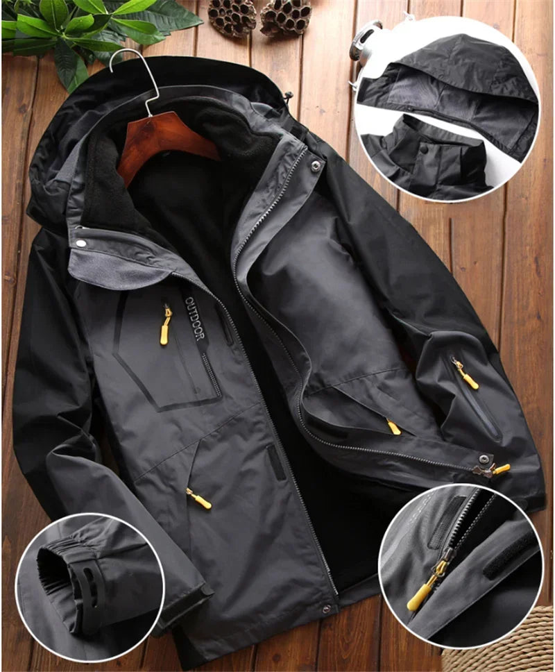 Black jacket with yellow zippers on a wooden surface, showing close-up details.